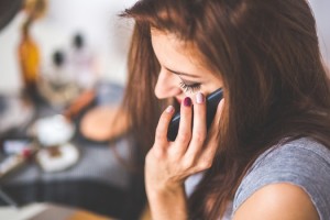 person-woman-hand-smartphone-medium