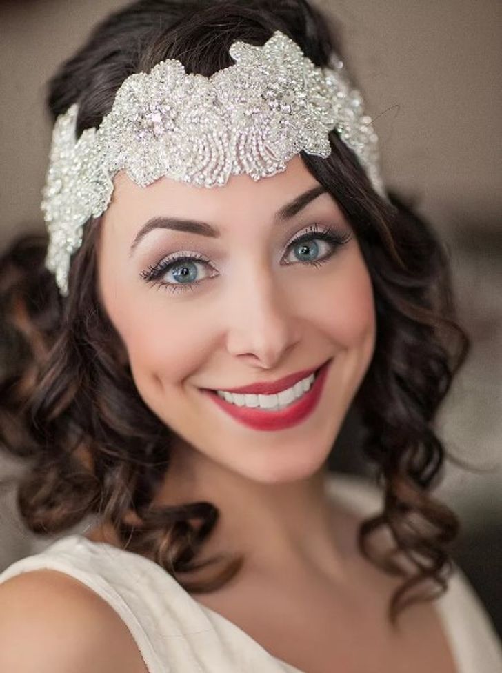 Short wedding hairstyle with a glamorous beaded headband