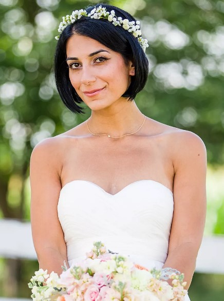 Short bob wedding hairstyle with a small flower crown