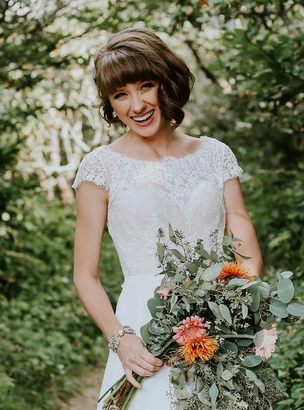 Face-framing curls brunette wedding hairstyle