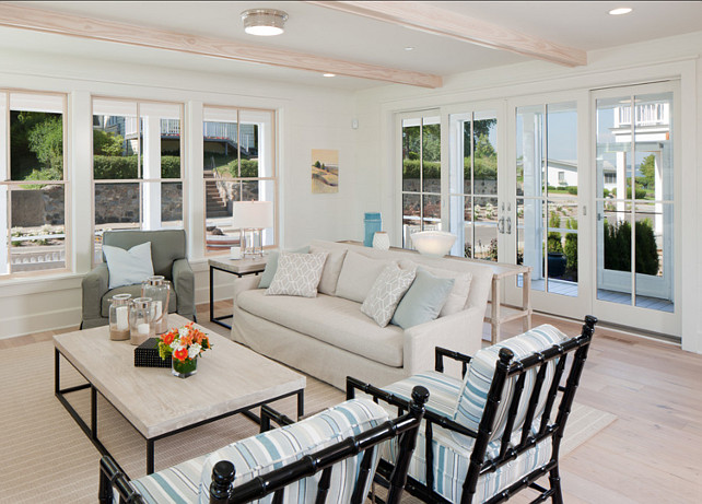 Living Room. Coastal Living Room Ideas. Beautiful living room with coastal decor. The faux bamboo armchairs are from 